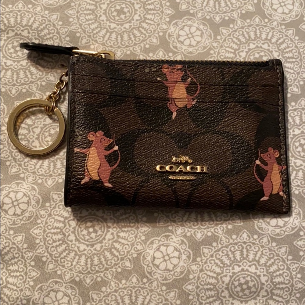 Authentic coach wristlet with small defect